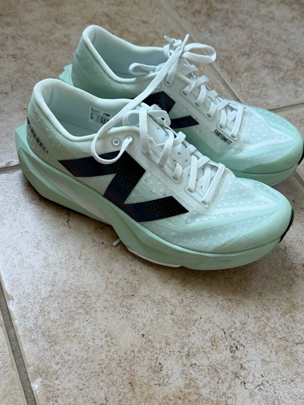 New Balance Women's Rebel Fuel Cell (Quarry Blue/Chrome Blue/Herron Blue color)